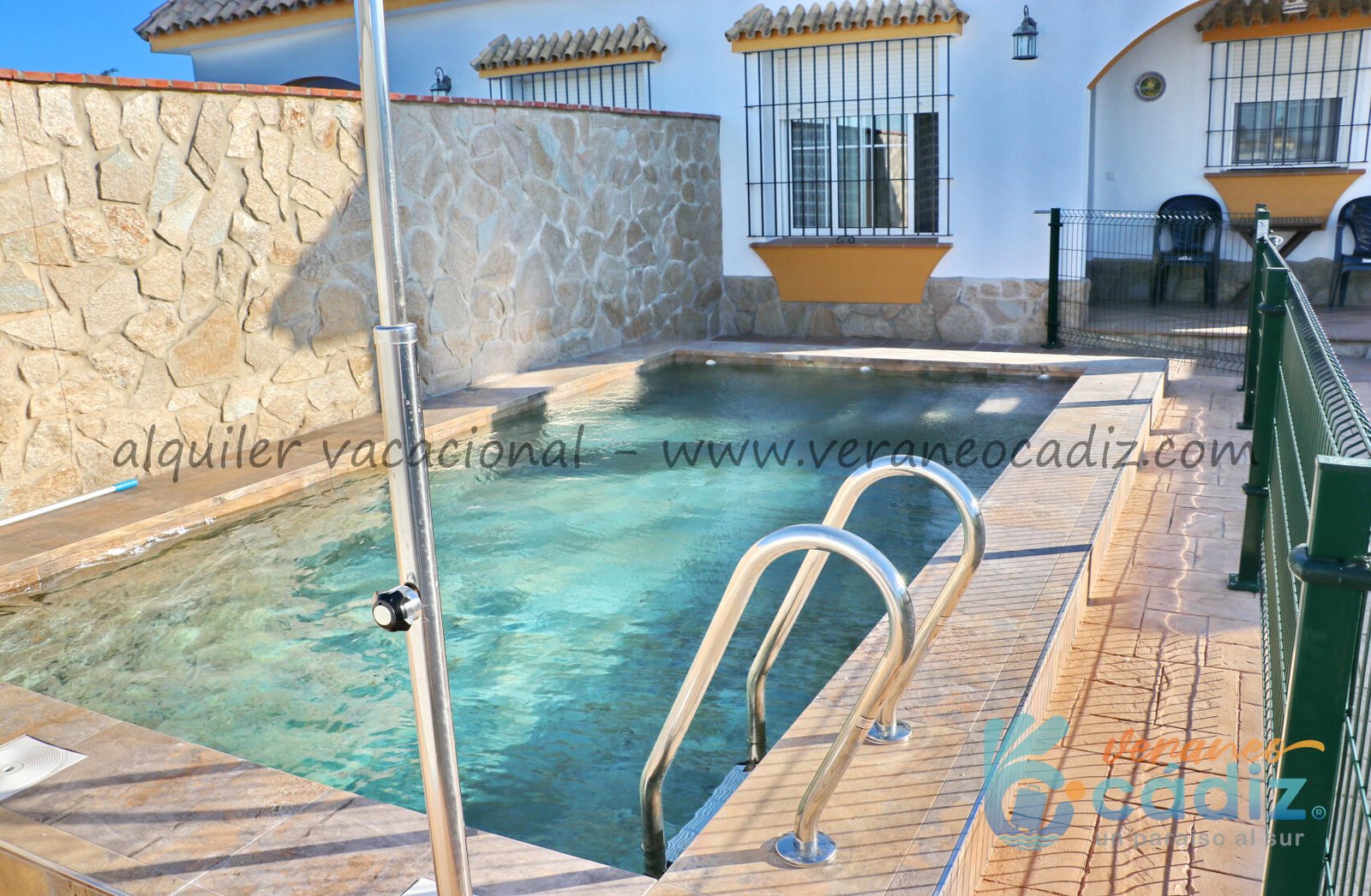 playa de el palmar con casas de alquiler