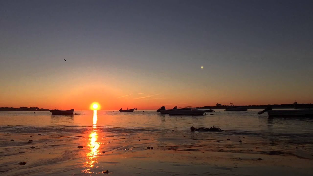 playa de sanlucar al atardecer
